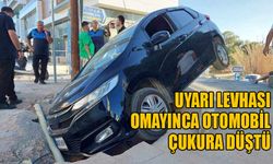 Uyarı levhası omayınca otomobil çukura düştü