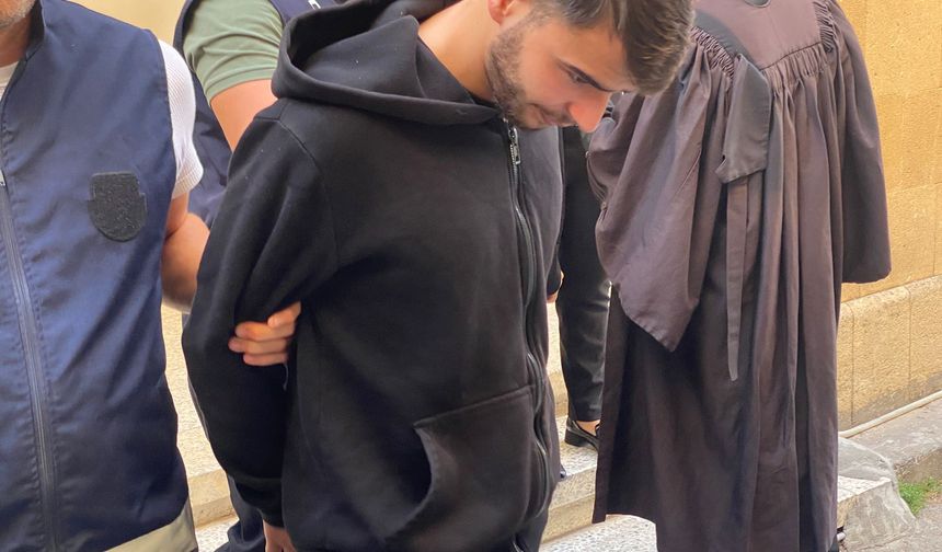 Alsancak'ta silahlı saldırı: Güney'e kaçan zanlı mahkemeye çıkarıldı